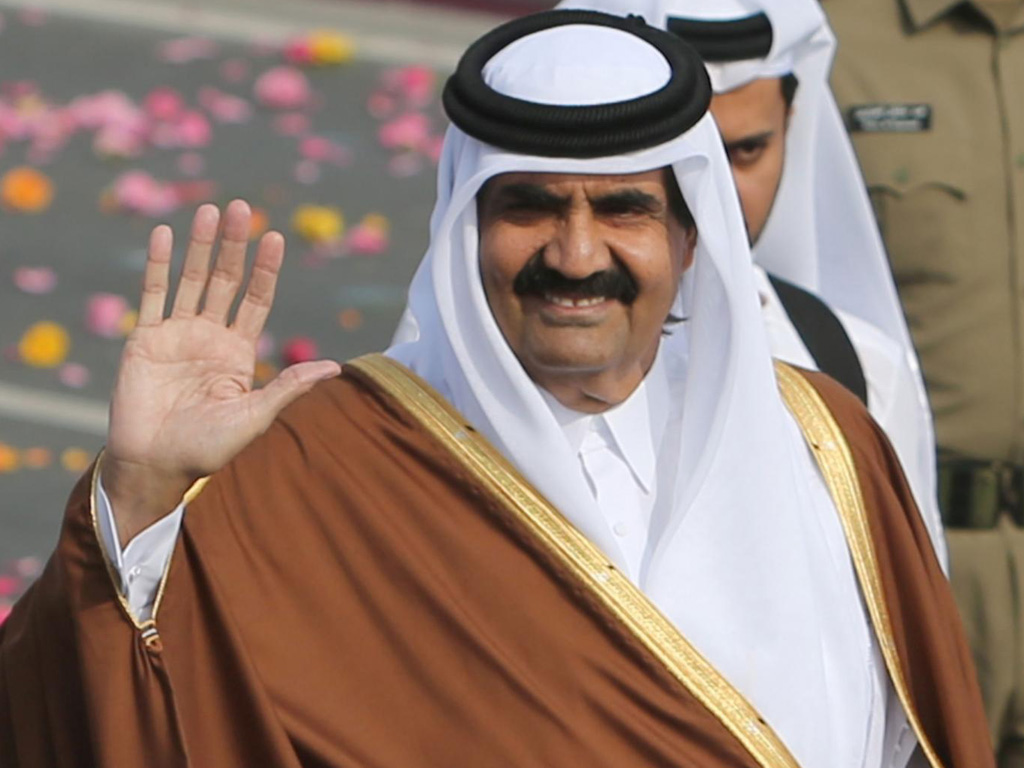 Cựu vương Hamad bin Khalifa Al Thani lúc còn tại vị - Ảnh: AFP