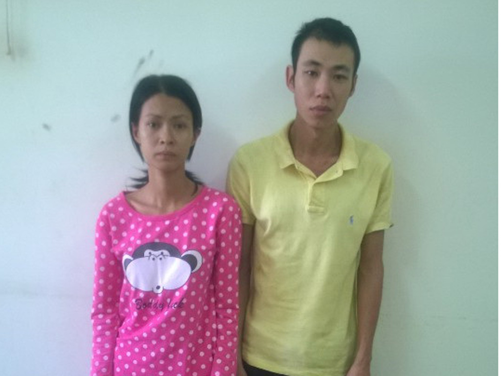 Hai vợ chồng Mi, Hào tại cơ quan công an - Ảnh: Mã Phong
