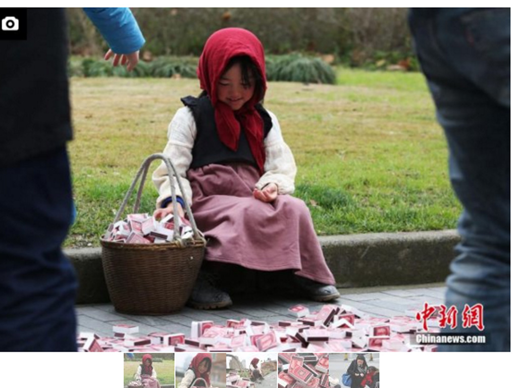 Cô bé bán diêm ở Bến Thượng Hải - Ảnh chụp màn hình Global Times