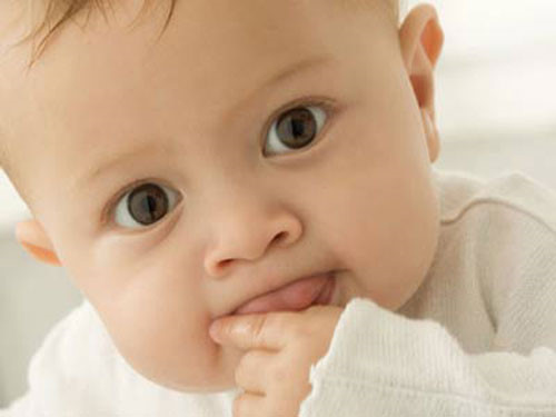 Trẻ sơ sinh cảm thấy đau giống người lớn - Ảnh: Shutterstock