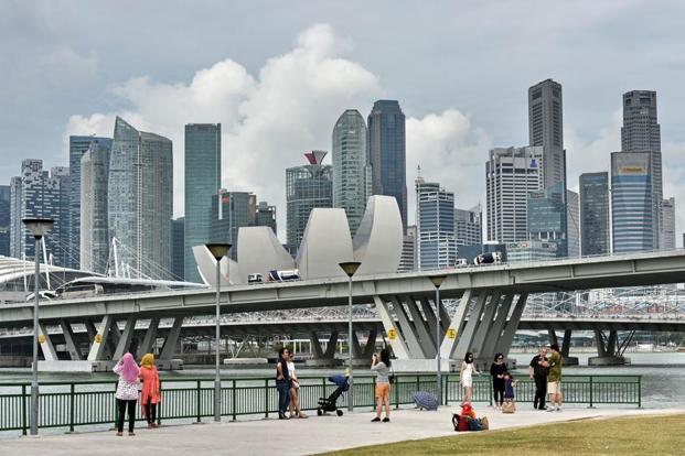Tình hình ảm đạm của kinh tế toàn cầu đã ảnh hưởng đến ngành du lịch Singapore - Ảnh: AFP