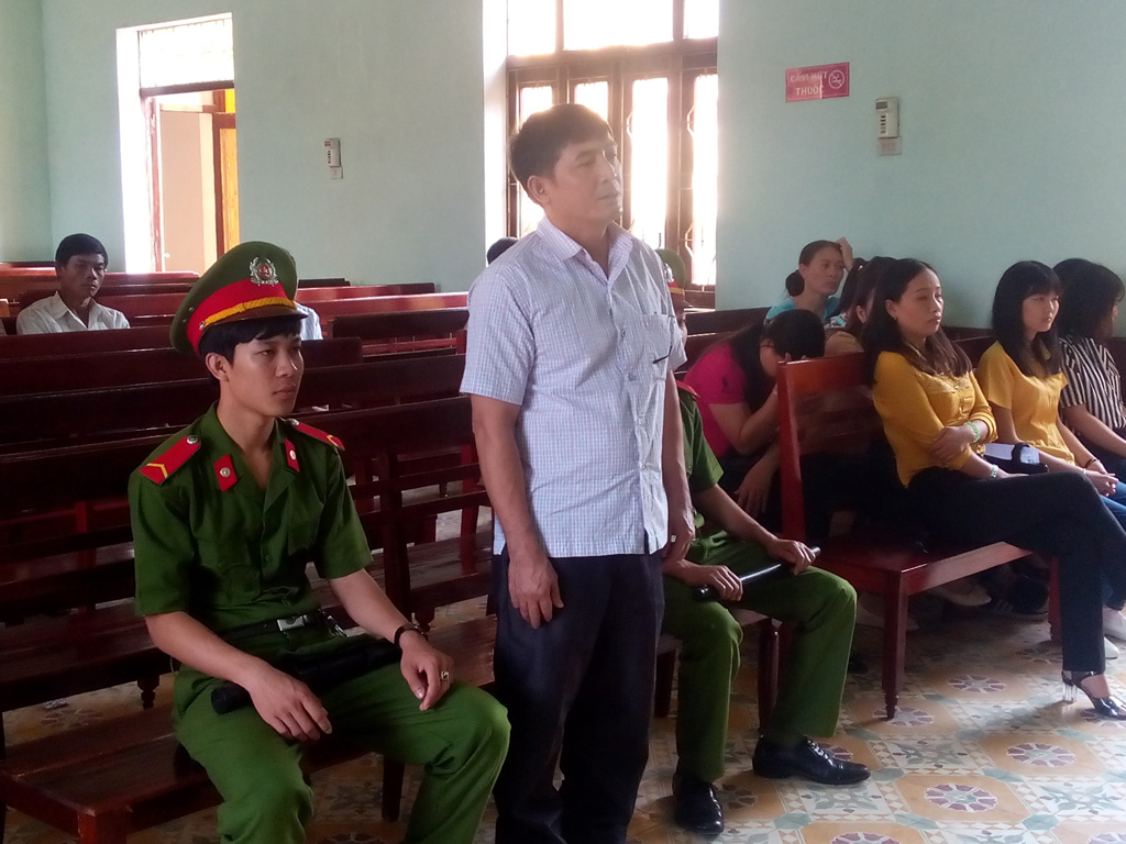 Bị cáo Trần Quang Hùng tại phiên tòa hình sự sơ thẩm sáng 8.4 - Ảnh: Phạm Anh