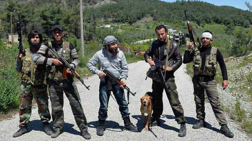Quân của lực lượng nổi dậy chống chính phủ của Tổng thống Syria - Ảnh: AFP
