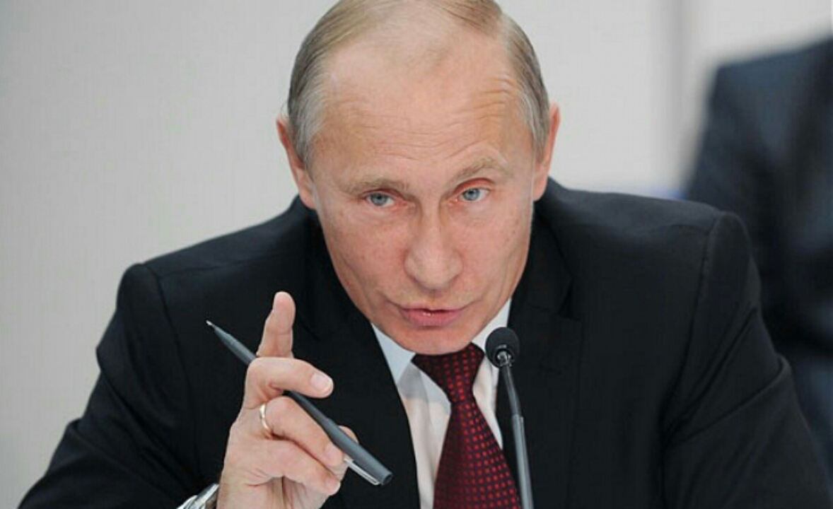 Tổng thống Nga Vladimir Putin không loại trừ khả năng thực hiện không kích chống IS ở Syria - Ảnh AFP