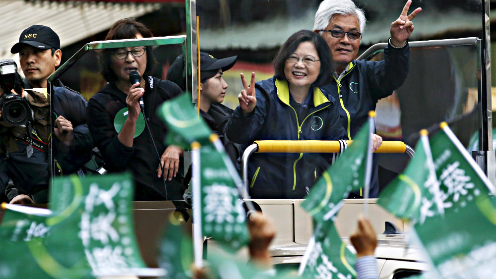 Chiến dịch tranh cử rầm rộ của đảng đối lập DPP trong cuộc đua vào chiếc ghế lãnh đạo mới của Đài Loan - Ảnh: Reuters