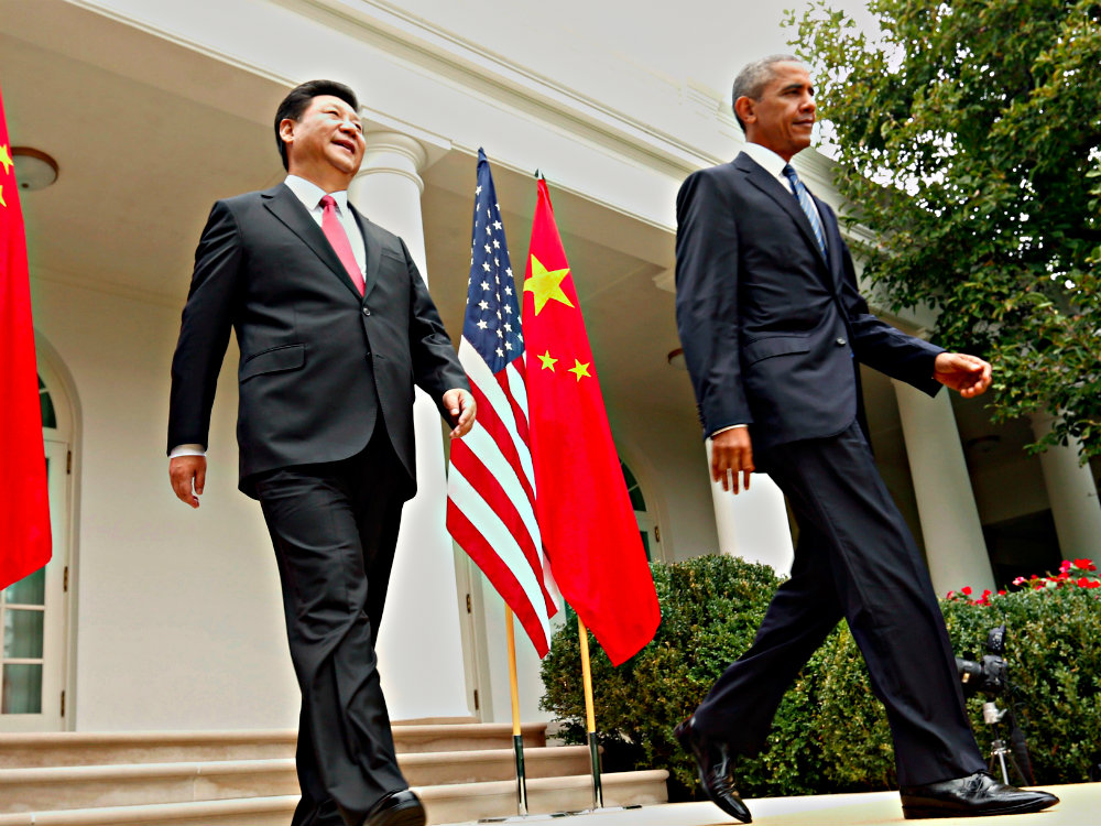 Chủ tịch Trung Quốc Tập Cận Bình và Tổng thống Mỹ Barack Obama đều muốn đẩy mạnh ảnh hưởng với ASEAN - Ảnh: Reuters