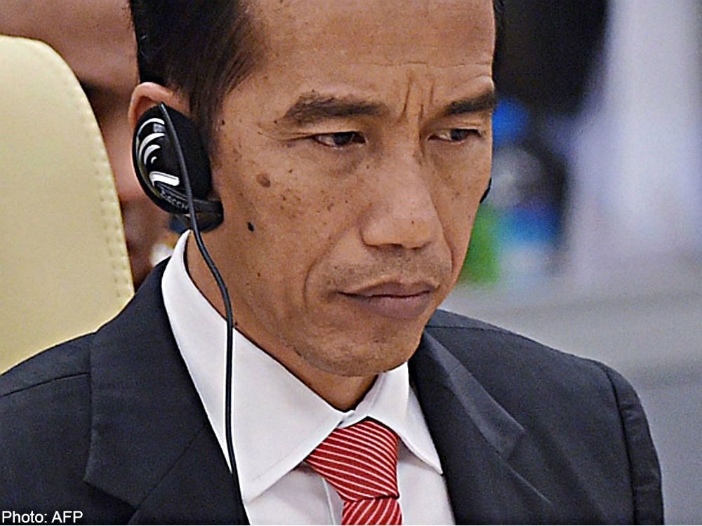 Tổng thống Indonesia được yêu cầu phải mạnh tay trong vụ tàu hải cảnh Trung Quốc ngăn cảnh sát biển Indonesia bắt tàu cá Trung Quốc đánh bắt phi pháp - Ảnh: AFP