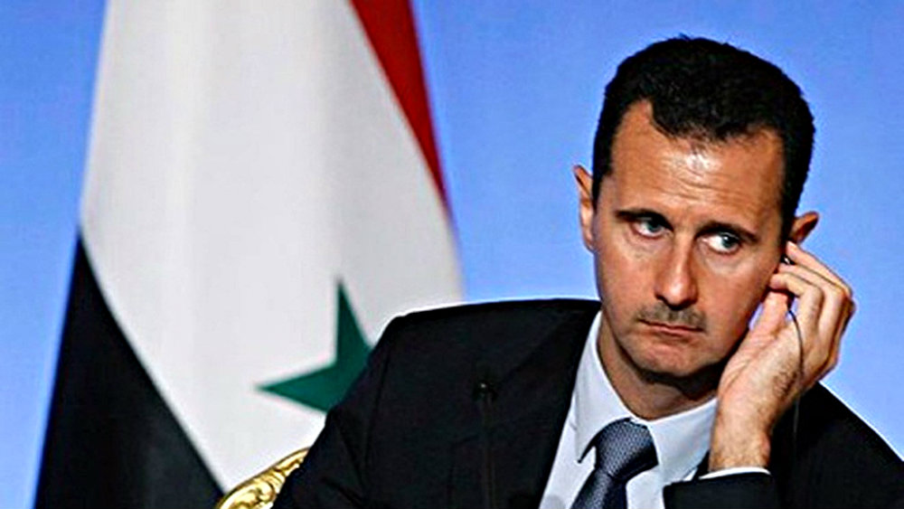 Ông Assad lại bị phe đối lập ở Syria phản đối - Ảnh: Reuters