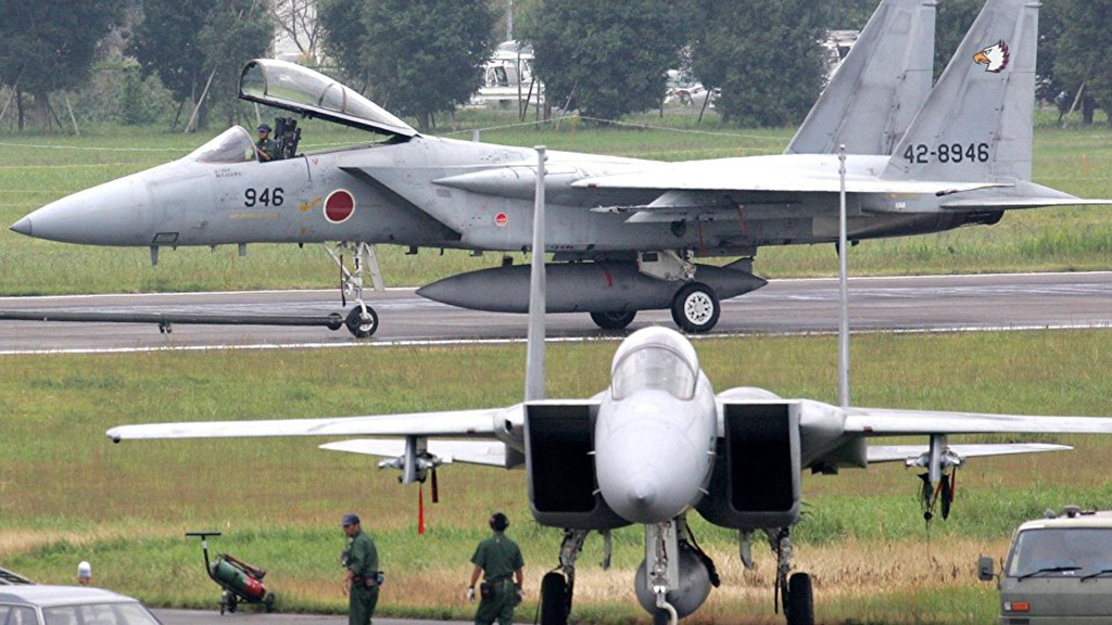 Tiêm kích F-15 của Không quân Nhật Bản. Máy bay Nhật gia tăng xuất kích cản chiến đấu cơ Trung Quốc trong 3 tháng đầu năm 2016 - Ảnh: AFP