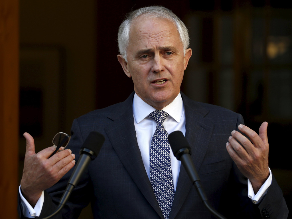 Tân Thủ tướng Úc Turnbull công bố với báo giới về nội các mới của ông tại Canberra ngày 21.9 - Ảnh: Reuters