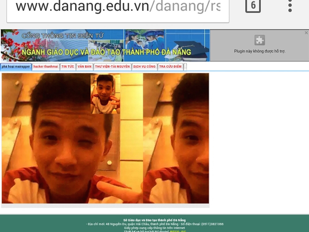 Giao diện website của Sở đăng hình thanh niên đang selfie sau khi bị hack - Ảnh: Hoàng Vinh