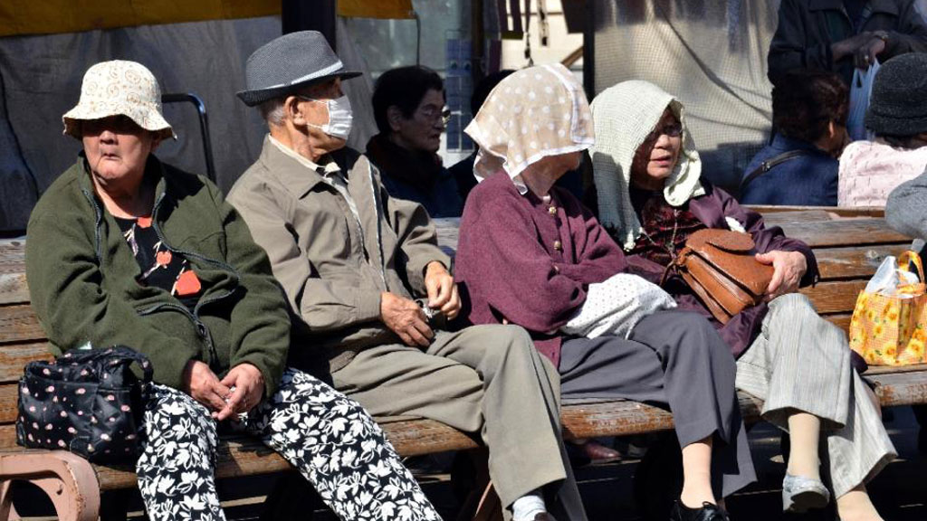 Dân số già sẽ tác động đến tăng trưởng kinh tế ở Đông Á - Ảnh: AFP