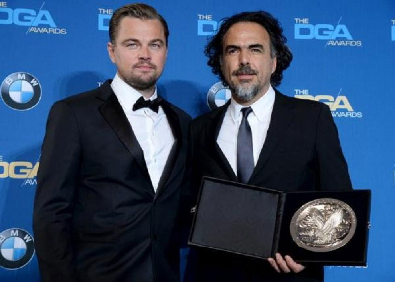 Đạo diễn Alejandro G. Iñárritu và nam diễn viên chính của 'Người về từ cõi chết' Leonardo DiCaprio (trái) - Ảnh: Reuters