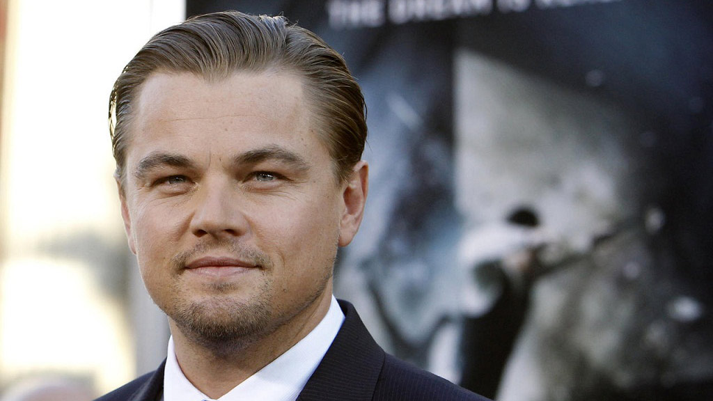 Leonardo DiCaprio lần đầu sở hữu tượng vàng tại BAFTA - Ảnh: Reuters