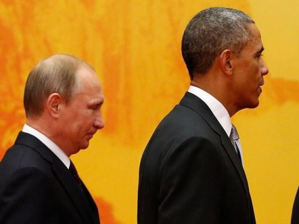 Nga cho rằng Tổng thống Putin (trái) không hề cầu cạnh để gặp Tổng thống Obama - Ảnh: Reuters