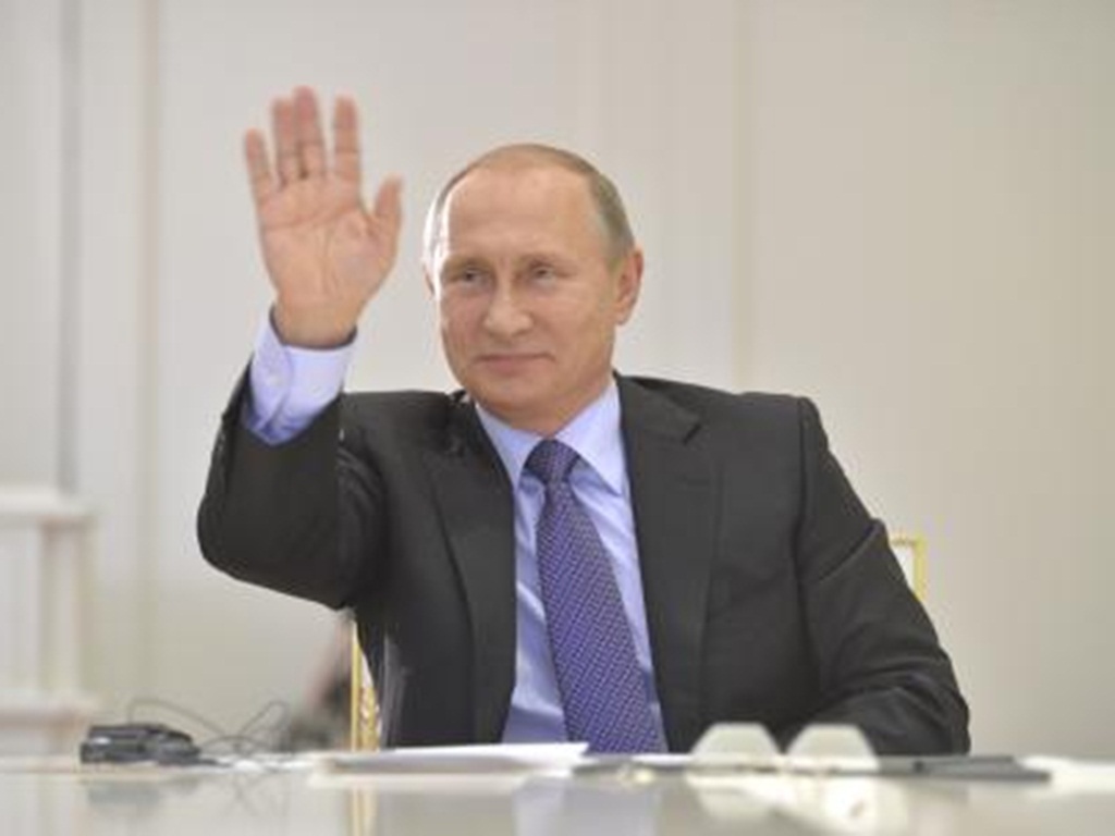 Tổng thống Putin nhận được sự tin tưởng lớn hơn từ người Nga nhờ một phần vào quyết định không kích ở Syria - Ảnh: Reuters