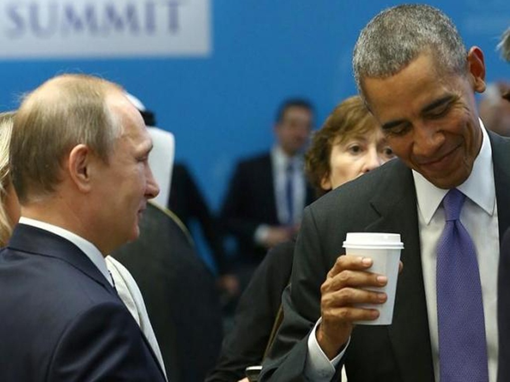Tổng thống Nga Putin (trái) và Tổng thống Mỹ Obama đã có buổi nói chuyện riêng 30 phút bàn về vấn đề Syria, Ukraine - Ảnh: Reuters