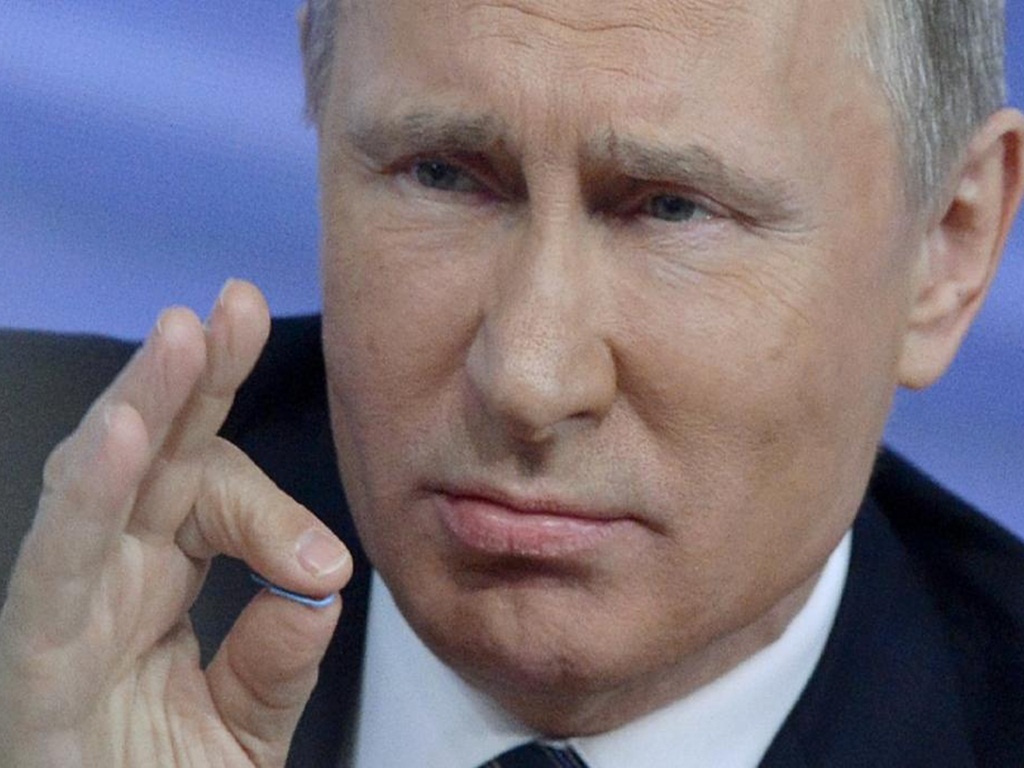 Tổng thống Nga Putin tán dương ứng viên tranh cử tổng thống Mỹ Donald Trump - Ảnh: AFP