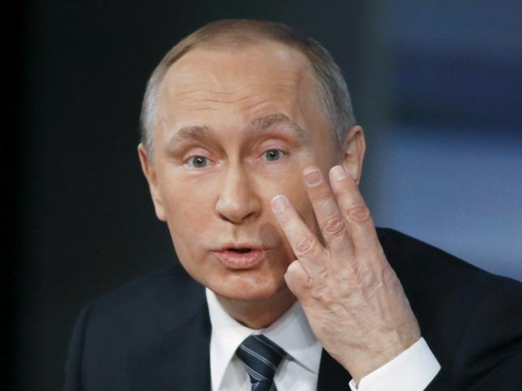 Tổng thống Nga Vladimir Putin tuyên bố sẵn sàng hòa hợp với bất kỳ vị tổng thống Mỹ nào trong tương lai - Ảnh: Reuters
