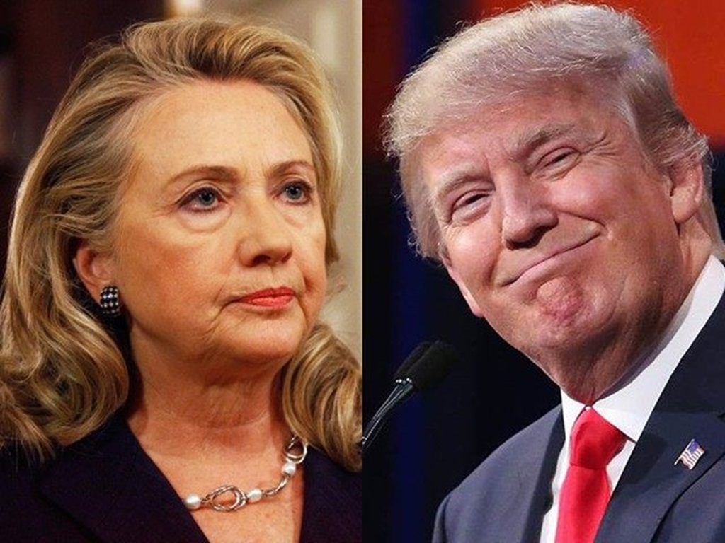 Bà Hillary Clinton (trái) và ông Donald Trump đang lần lượt dẫn đầu cuộc thăm dò của cử tri ở Iowa ngay trước ngày bầu cử sơ bộ theo hình thức họp kín (caucus) của bang này - Ảnh: Reuters
