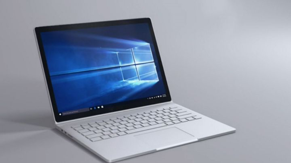 Apple đang nuôi ý tưởng một máy tính xách tay lai như Surface Book - Ảnh: Microsoft