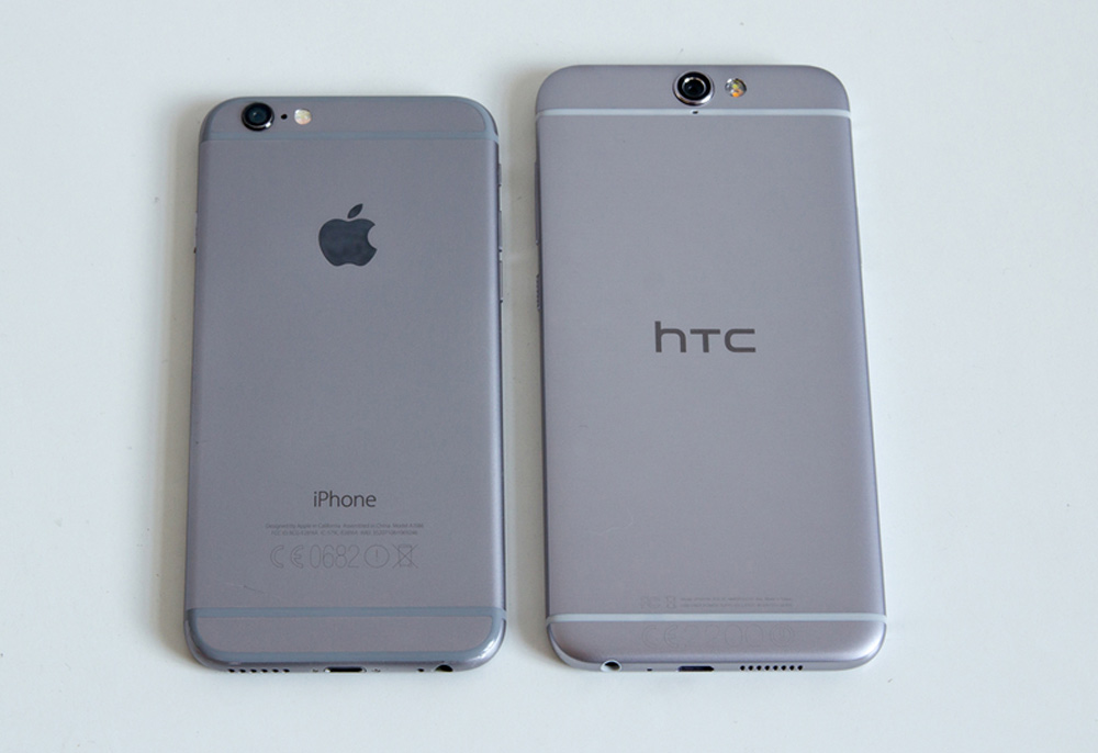 HTC One A9 (phải) bên cạnh chiếc iPhone 6 - Ảnh: AFP