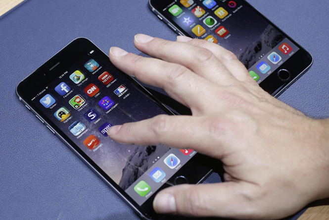 Công ty hỗ trợ FBI mở khóa iPhone 5C đã có thể mở khóa iPhone 6 chạy iOS 9? - Ảnh: AFP