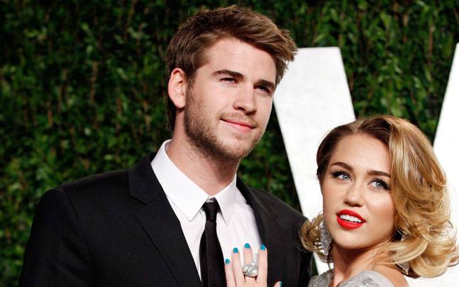 Miley Cyrus và Liam Hemsworth đã quay về bên nhau - Ảnh: Reuters