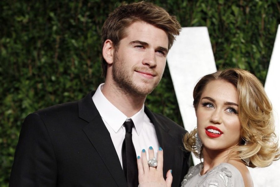 Miley Cyrus và Liam Hemsworth hạnh phúc bên nhau - Ảnh: Reuters