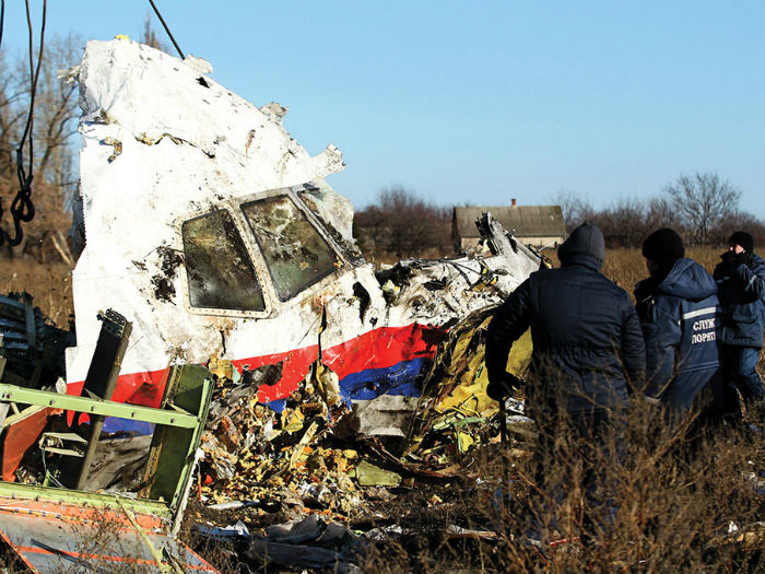 Chính phủ Hà Lan cho biết nước này tìm thấy thêm nhiều phần thi thể của các nạn nhân trong thảm họa rơi máy bay MH17 - Ảnh: Reuters