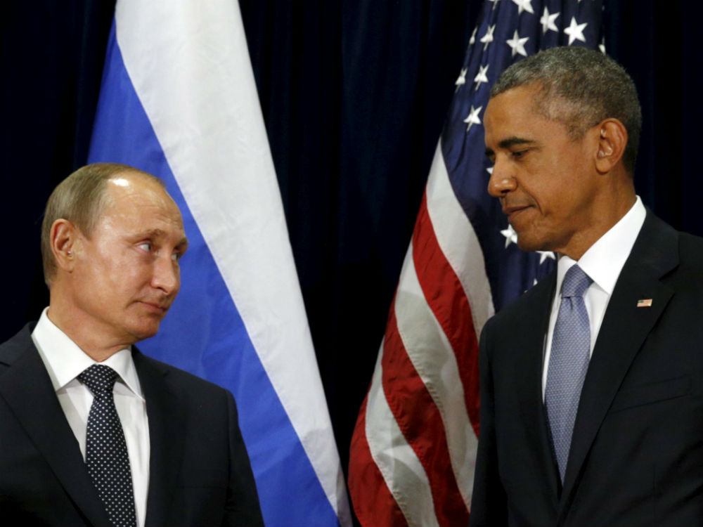 Tổng thống Nga Vladimir Putin và Tổng thống Mỹ Barack Obama chỉ trích lẫn nhau trong bài phát biểu - Ảnh: Reuters