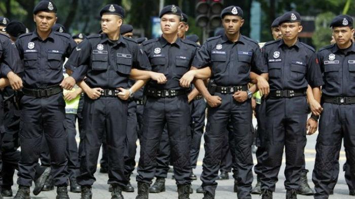 Cảnh sát Malaysia - Ảnh: Reuters