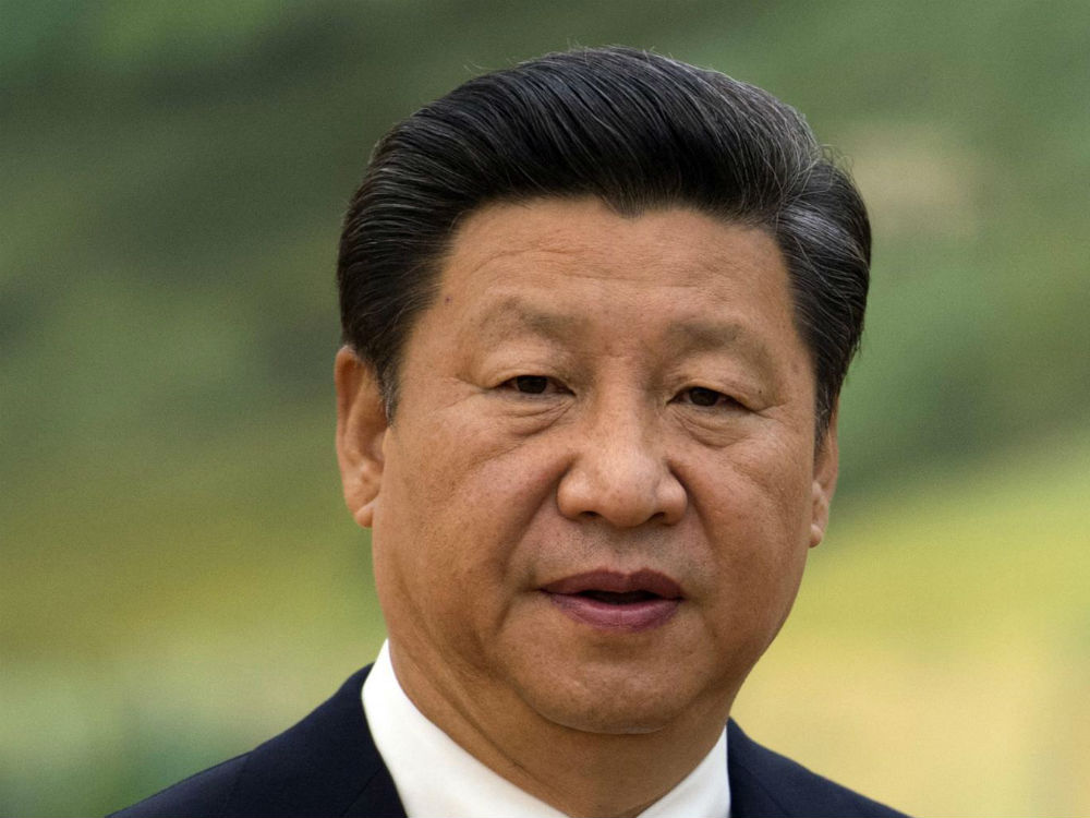 Chủ tịch Tập Cận Bình lên án việc IS hành quyết công dân Trung Quốc - Ảnh: AFP