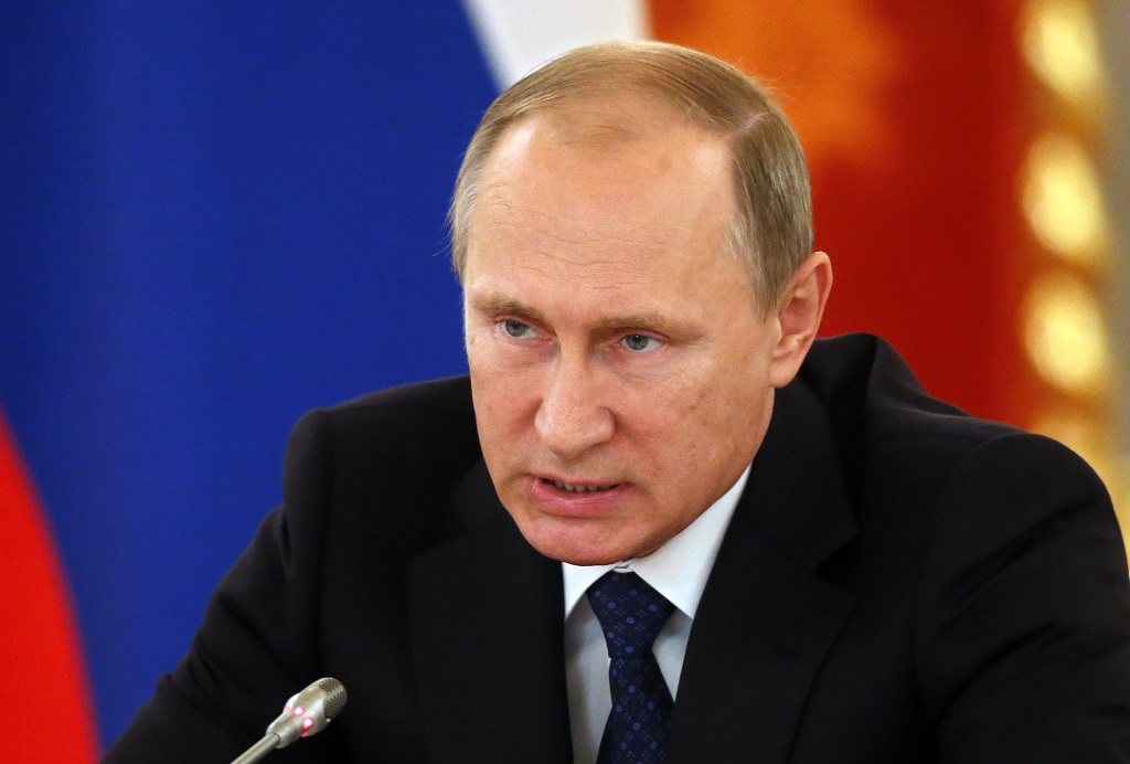 Tổng thống Nga Vladimir Putin đã ký sắc lệnh ngừng Hiệp định thương mại tự do (FTA) giữa Nga và Ukraine từ ngày 1.1.2016 - Ảnh: AFP