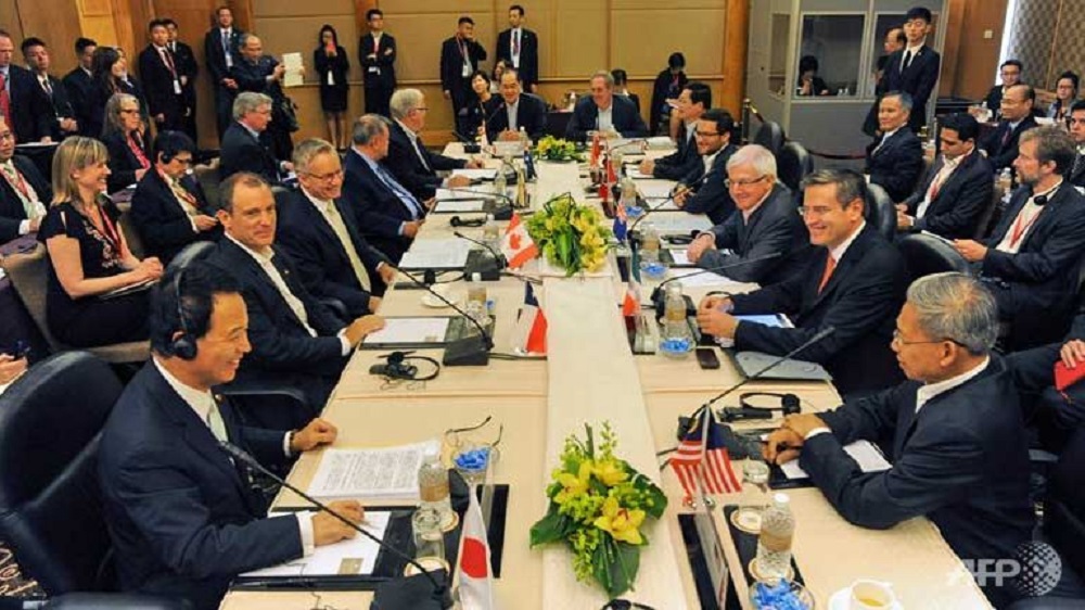 Đại diện các nước bên bàn đàm phán TPP ở Singapore - Ảnh: AFP