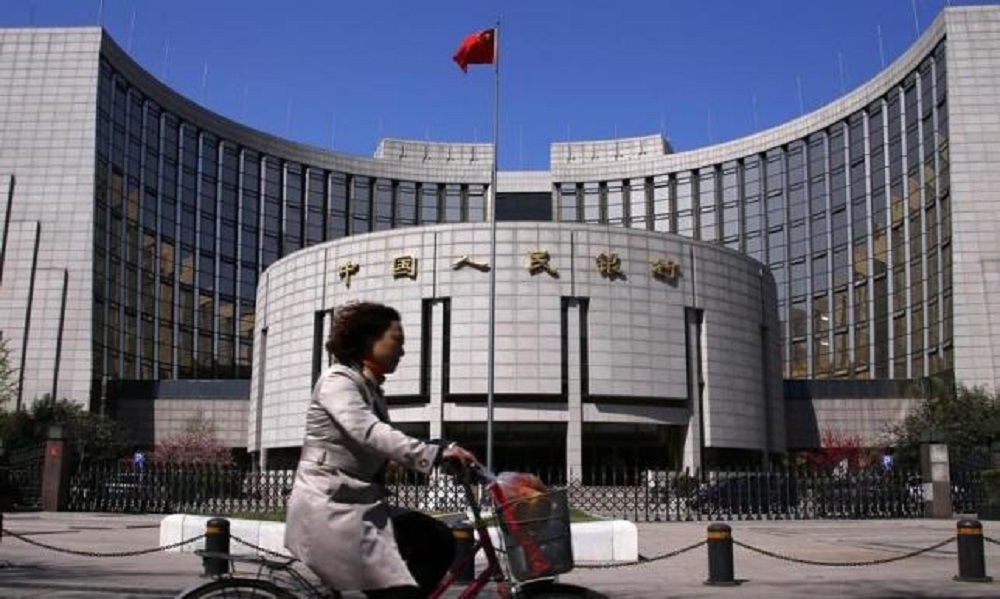 Trung Quốc lần đầu mở cửa thị trường ngoại hối liên ngân hàng cho người nước ngoài - Ảnh: Reuters