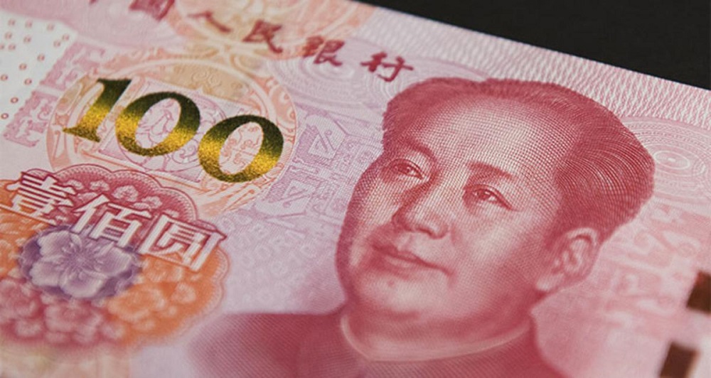 Nhân dân tệ của Trung Quốc vừa bất ngờ tăng giá so với USD - Ảnh: Bloomberg