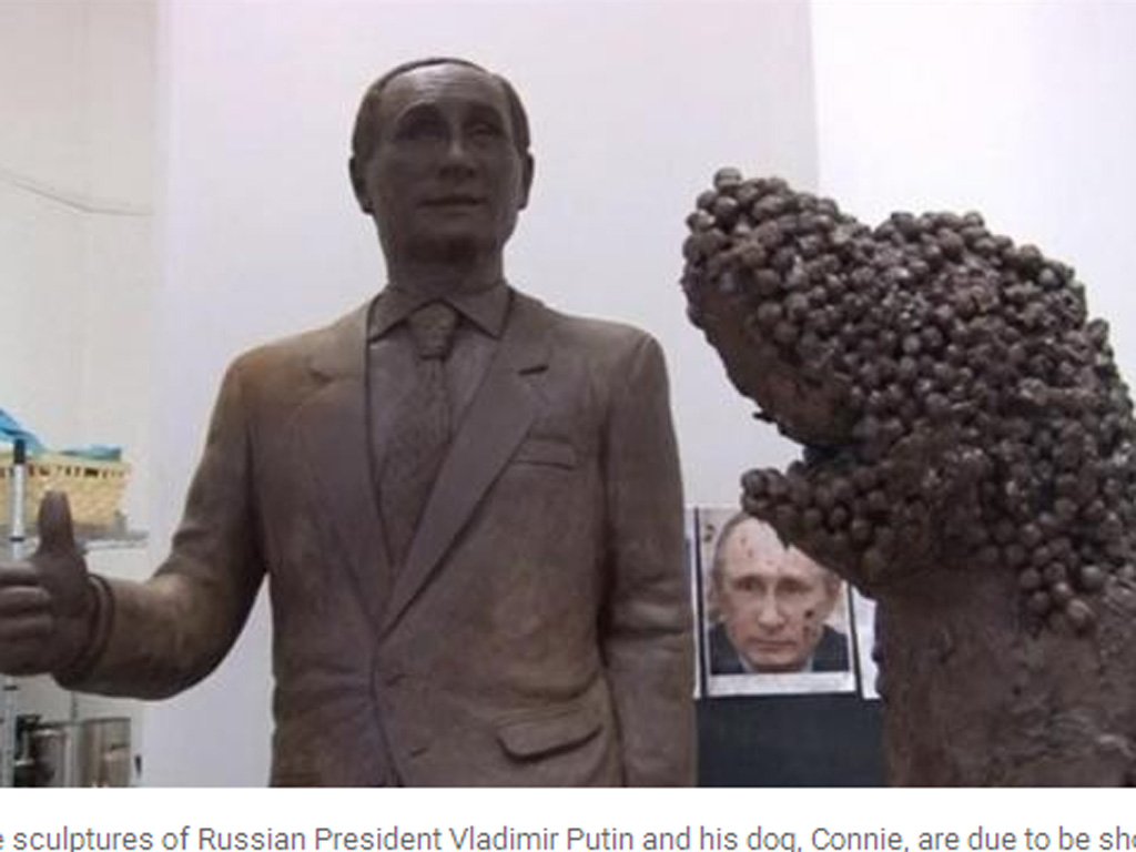 Tượng ông Putin và chó cưng Connie - Ảnh chụp màn hình website UPI