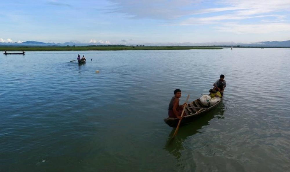 Một con sông ở Buthidaung, Myanmar - Ảnh: Reuters