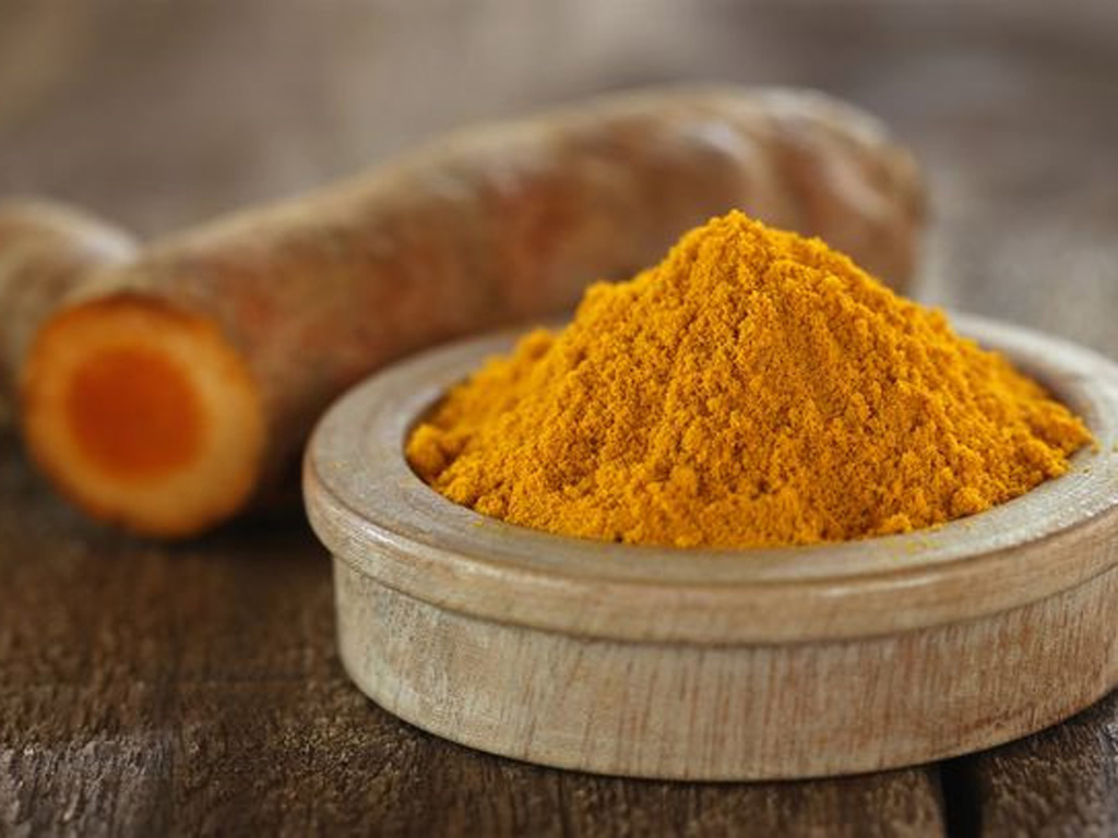 Nghệ chứa chất curcumin có tác dụng giảm đau nhức hiệu quả - Ảnh: Shutterstock​