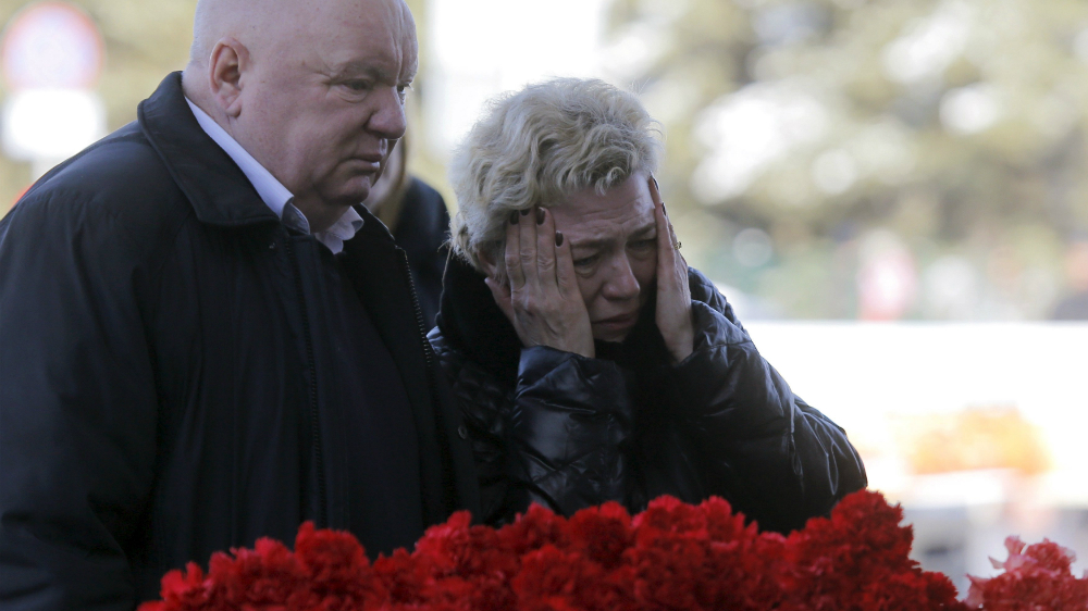 Lễ tưởng niệm những nạn nhân vụ máy bay FlyDubai rơi diễn ra tại thành phố Rostov-on-Don của Nga - Ảnh: Reuters