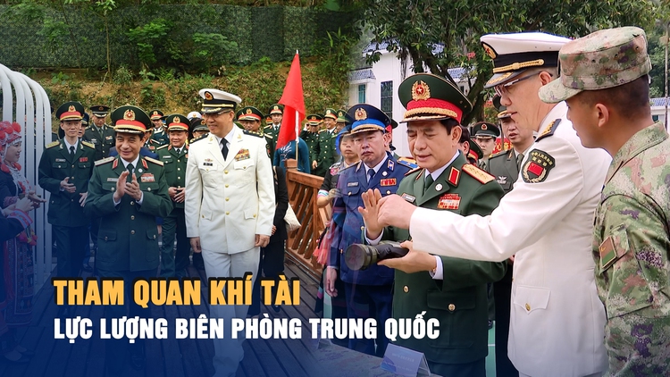 Đại tướng Phan Văn Giang tham quan khí tài của lực lượng biên phòng Trung Quốc