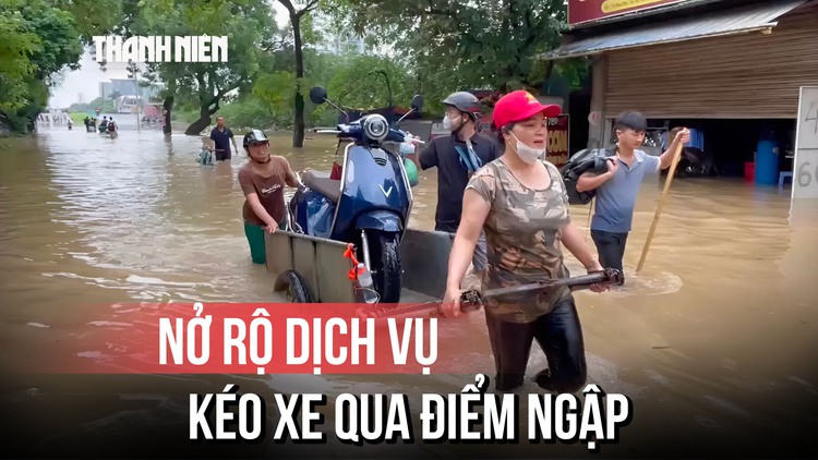 Bất ngờ dịch vụ 'kéo xe qua điểm ngập'