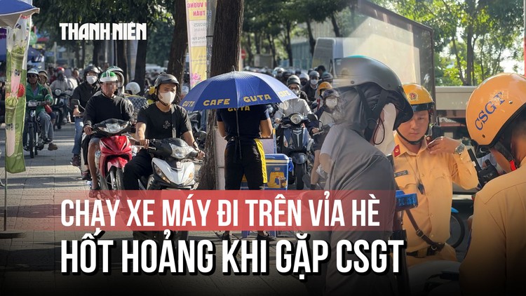 Người chạy xe máy đi trên vỉa hè đường Võ Thị Sáu hốt hoảng khi gặp CSGT