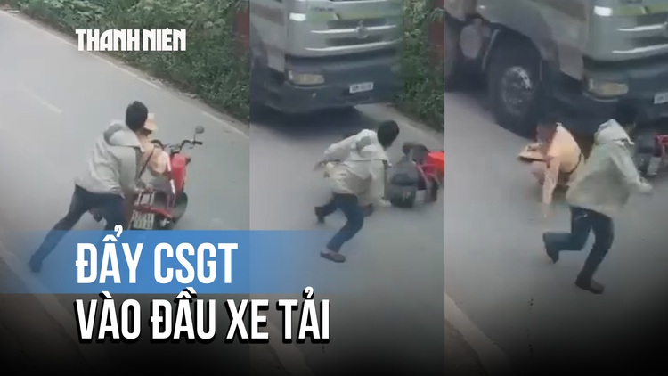 Hà Nội: Điều tra vụ người đàn ông đẩy chiến sĩ CSGT vào đầu xe tải về tội giết người!