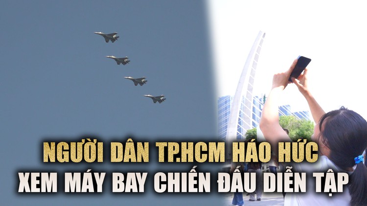 Người dân háo hức xem máy bay chiến đấu diễn tập trên bầu trời TP.HCM