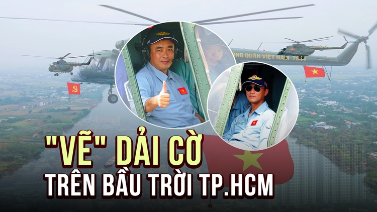 Lần đầu tiên trực thăng quân sự 'vẽ' dải cờ Tổ quốc giữa bầu trời TP.HCM