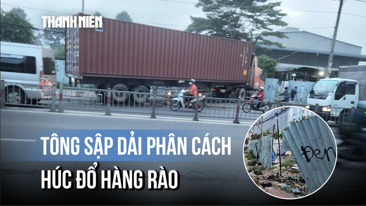 Thót tim xe container tông dải phân cách, húc đổ hàng rào ở vùng ven TP.HCM