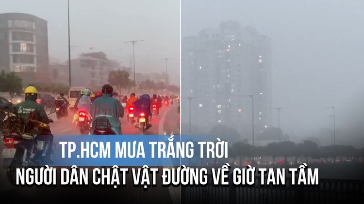 TP.HCM mưa trắng trời, người dân chật vật đường về giờ tan tầm