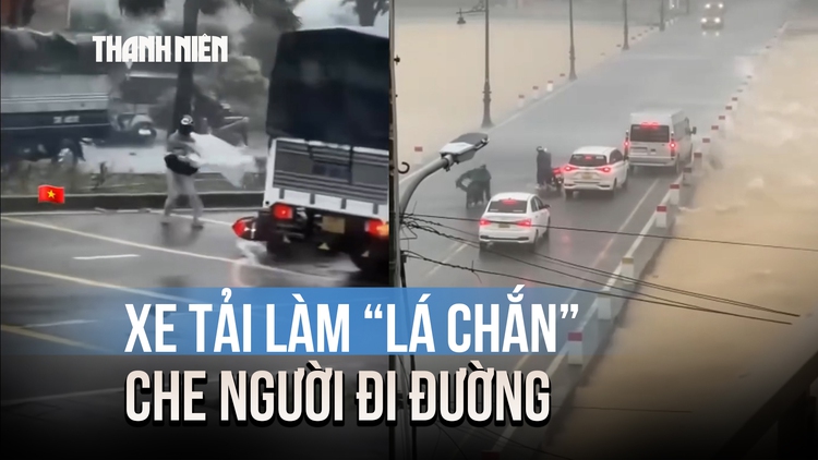 Hành động đẹp giữa bão số 10: Xe tải làm 'lá chắn' che chở người đi đường